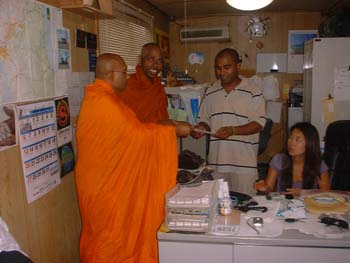 Mr Shane is hand over the letter of donation a car to Tanzania temple.jpg